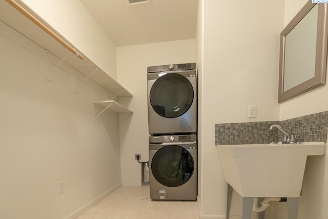 1205 SW Hannah St, Pullman, WA 99163 - washroom with stacked washer / dryer and baseboards