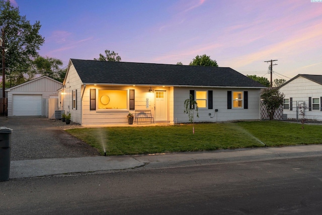 2008 Tinkle St, Richland, WA 99352 - single story home featuring driveway, an outbuilding, a front lawn, a shingled roof, and a garage