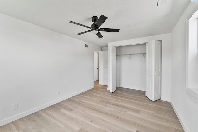 2008 Tinkle St, Richland, WA 99352 - unfurnished bedroom featuring light wood-style flooring, baseboards, and a closet