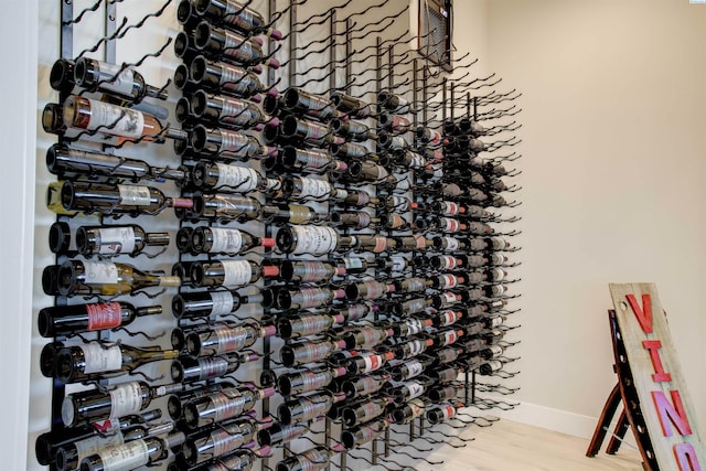 wine cellar featuring hardwood / wood-style flooring