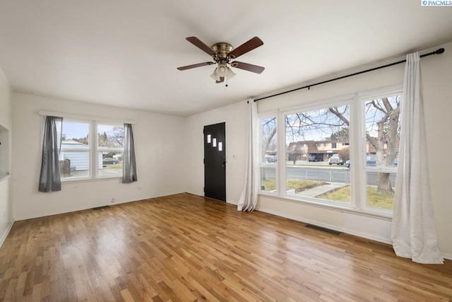 interior space featuring ceiling fan and light hardwood / wood-style floors