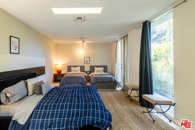 bedroom with a textured ceiling