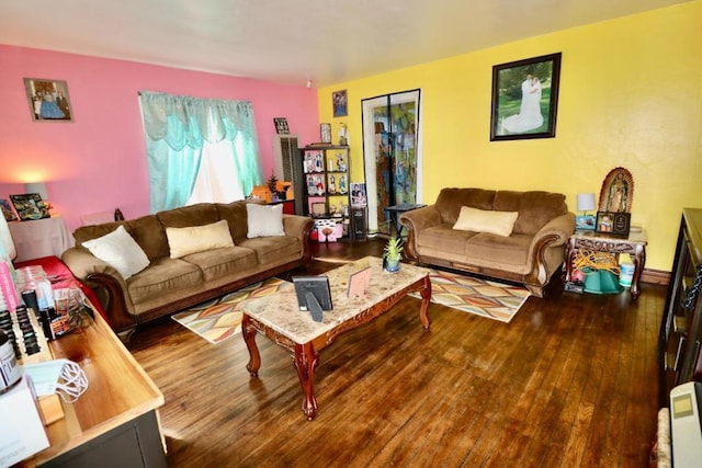 living room featuring dark hardwood / wood-style flooring