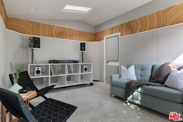 living area with light carpet and lofted ceiling