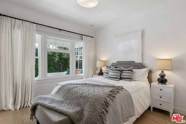 bedroom featuring light hardwood / wood-style floors