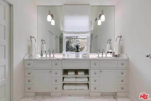 bathroom with tile floors, double sink, and oversized vanity