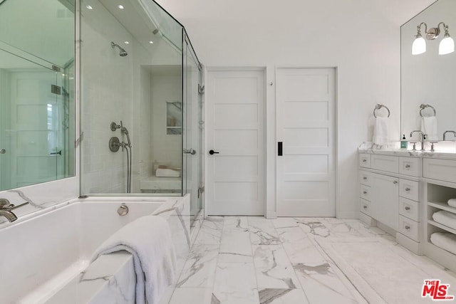 bathroom featuring tile floors and vanity