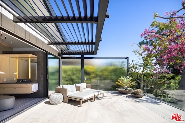 view of terrace featuring an outdoor living space and a pergola