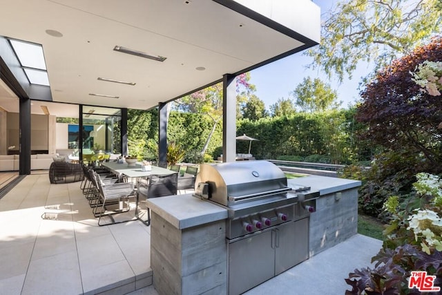 view of patio featuring grilling area and an outdoor kitchen