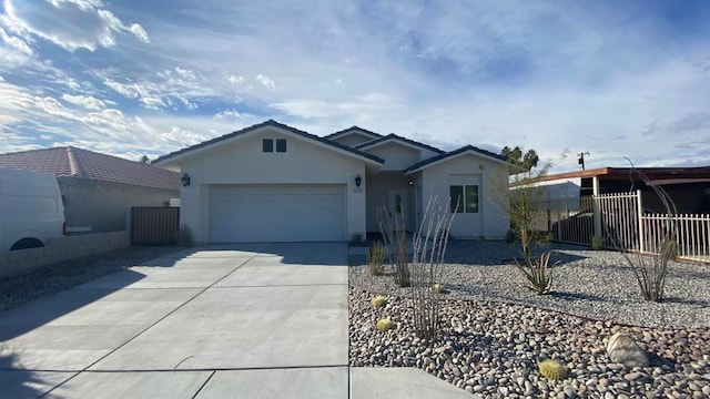 ranch-style home featuring a garage