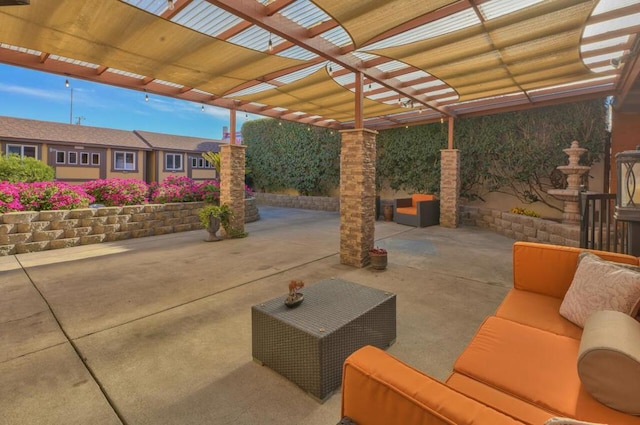 view of patio with a pergola and an outdoor living space