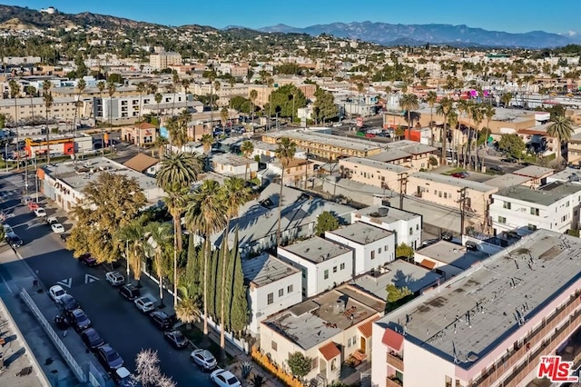 drone / aerial view featuring a mountain view