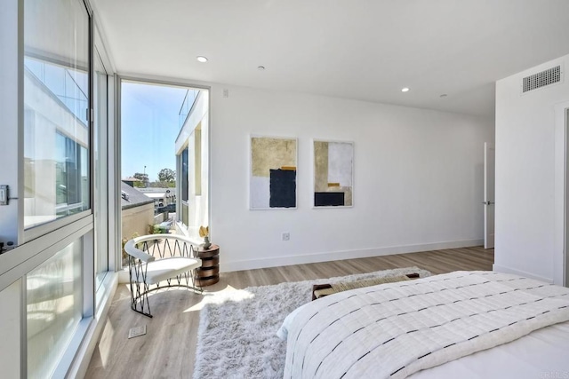 bedroom featuring light hardwood / wood-style floors