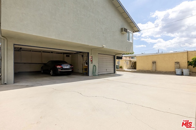 view of property exterior featuring a garage