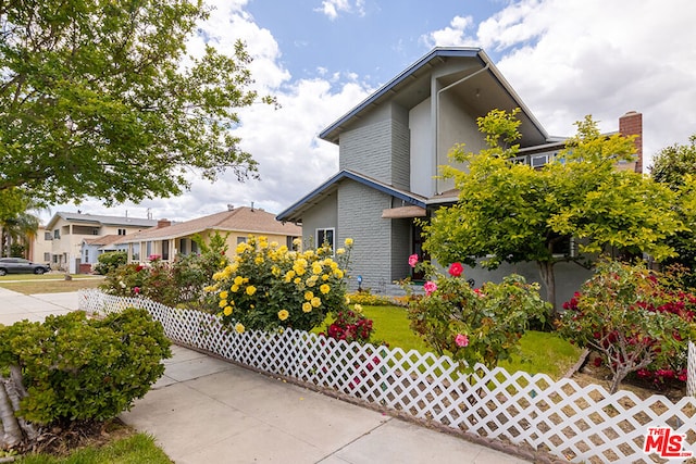 view of property exterior featuring a yard