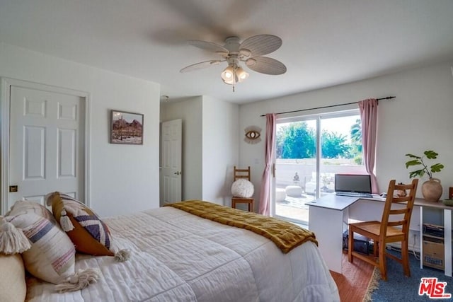 bedroom featuring access to exterior, ceiling fan, and hardwood / wood-style flooring