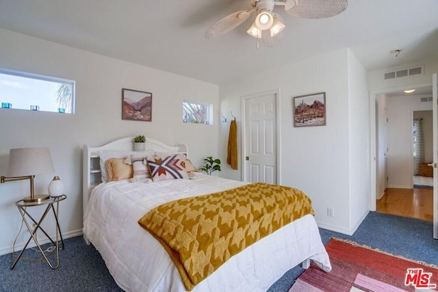 carpeted bedroom with ceiling fan