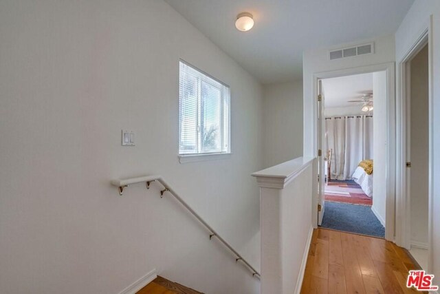 hallway featuring light hardwood / wood-style floors