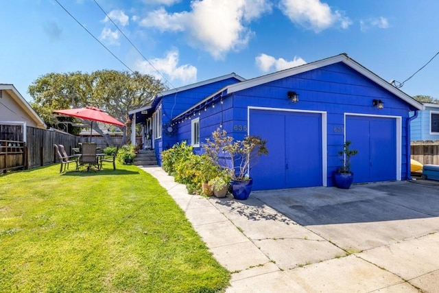 garage featuring a yard