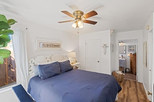 bedroom featuring ceiling fan and dark hardwood / wood-style flooring