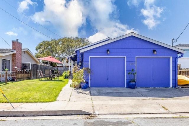 garage with a yard