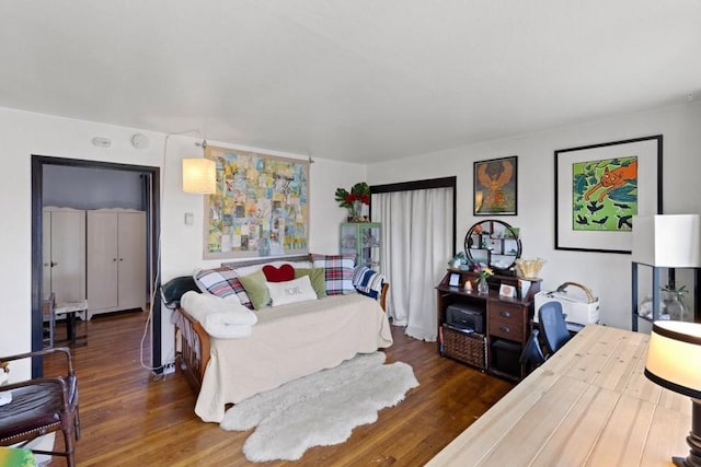 bedroom featuring dark wood-type flooring