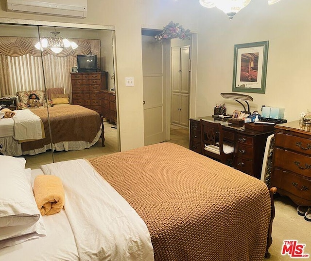 bedroom featuring an inviting chandelier, light colored carpet, and a wall mounted AC