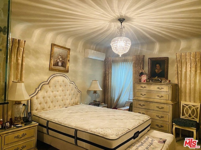 bedroom featuring an AC wall unit and a chandelier