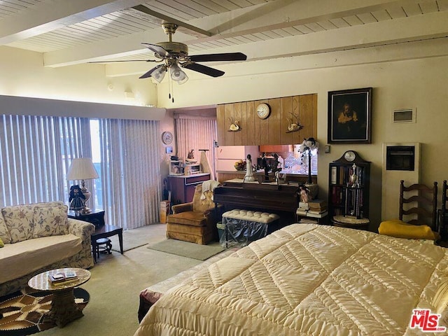 bedroom featuring ceiling fan, beam ceiling, and light carpet