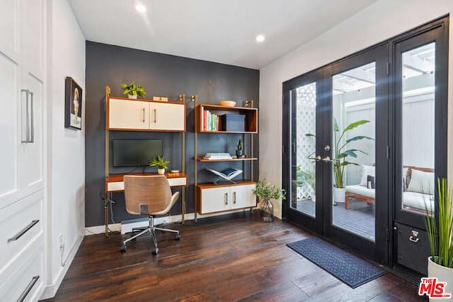 home office with dark hardwood / wood-style flooring and french doors