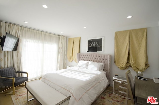 bedroom featuring hardwood / wood-style floors