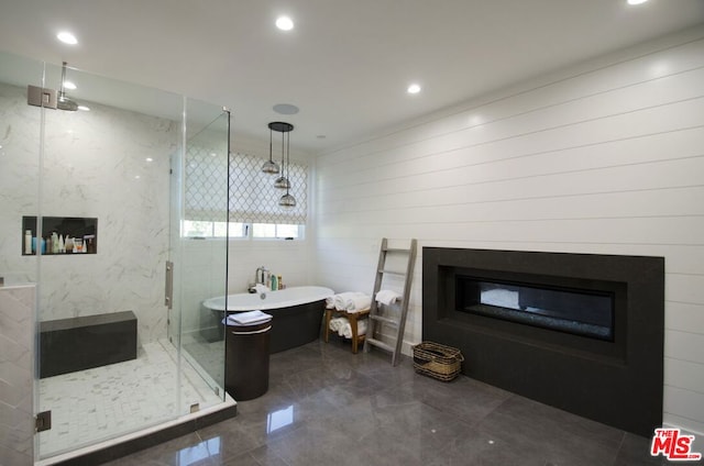 bathroom featuring plus walk in shower