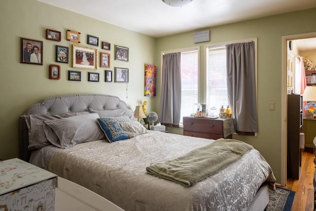 bedroom featuring wood-type flooring