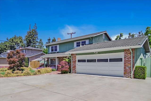 front of property with a garage