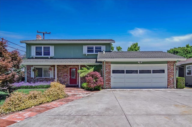 front of property featuring a garage