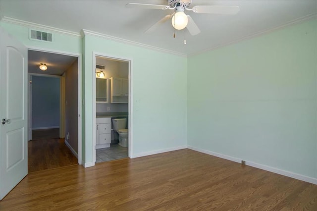 interior space with ornamental molding, ceiling fan, and hardwood / wood-style floors