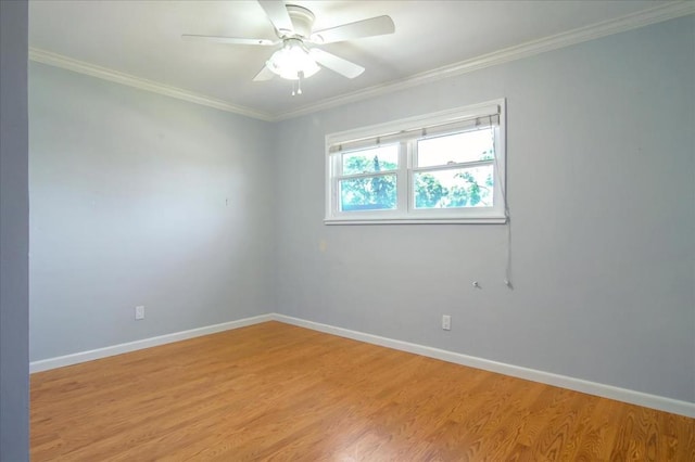 unfurnished room featuring ceiling fan, light hardwood / wood-style flooring, and ornamental molding