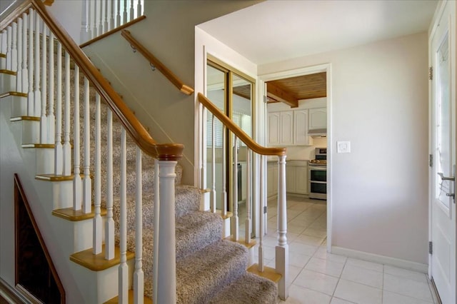 staircase with tile patterned flooring