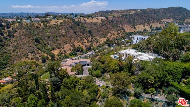 drone / aerial view featuring a mountain view