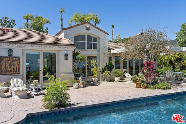 rear view of property with a patio area