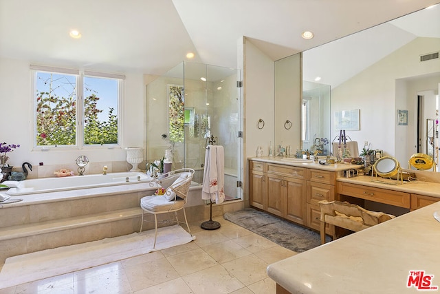 bathroom featuring vanity, tile patterned floors, lofted ceiling, and plus walk in shower