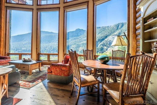 sunroom / solarium with a mountain view