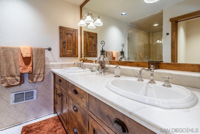 bathroom featuring double sink vanity and tile floors