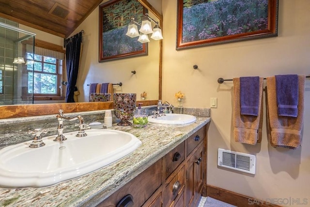 bathroom featuring dual vanity, lofted ceiling, and wooden ceiling