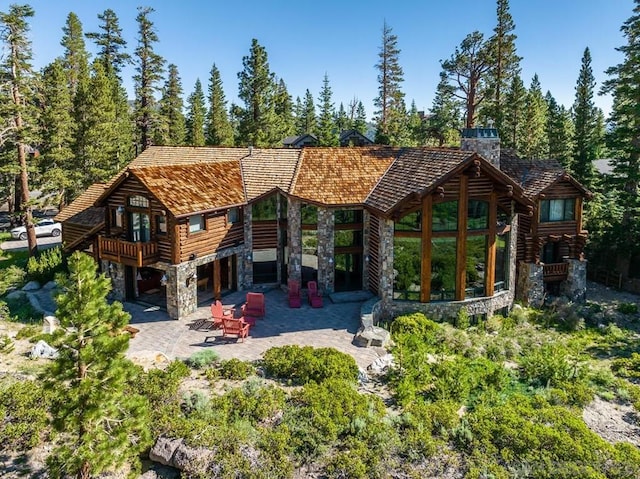 back of house featuring a patio