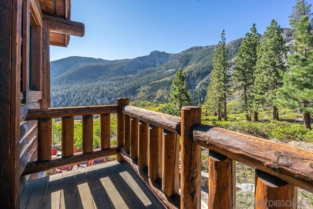 balcony featuring a mountain view