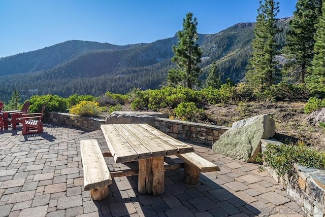 view of patio / terrace with a mountain view