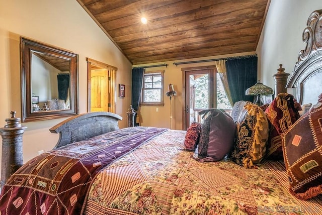 bedroom with lofted ceiling and wooden ceiling