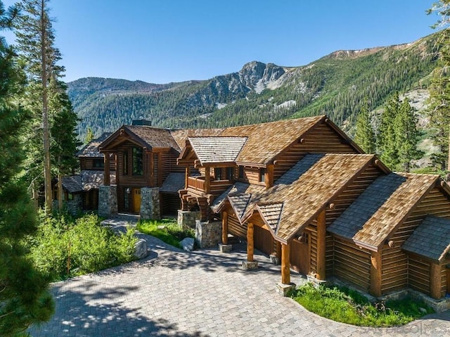 view of front of home with a mountain view