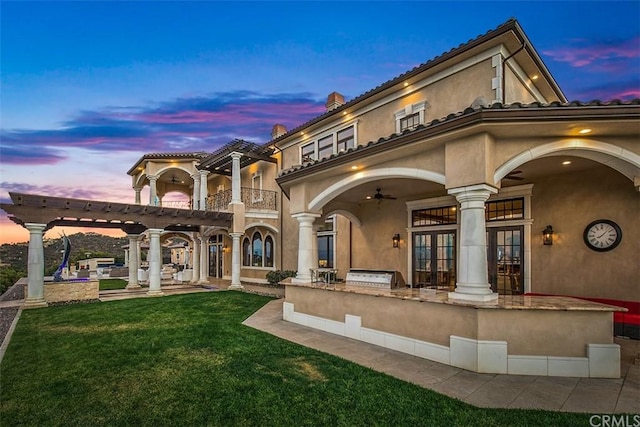 exterior space featuring french doors, ceiling fan, a balcony, area for grilling, and a pergola